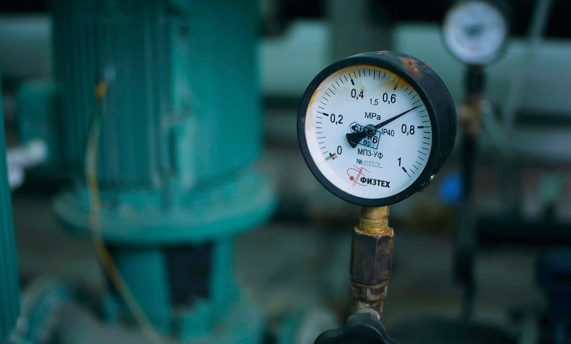 Close up of high-pressure industrial barometers in a hydraulic system. Clip. Barometer at the